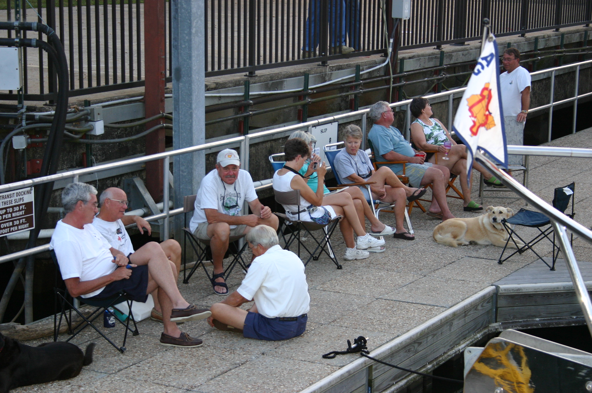 AGLCA burgee on the bow, at the 2004 rendezvous, Joe Wheeler State Park. Fred Myers seated on dock giving us all some good advice!